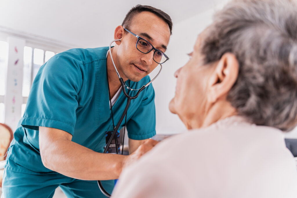 Nurse checking patient health during home care service